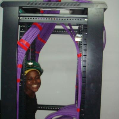 Suzan in one of meny comincation racks at Total E&P Uganda